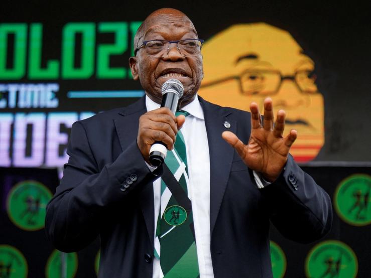 Former South African President Jacob Zuma addresses supporters in front of the High Court in Pietermaritzburg.