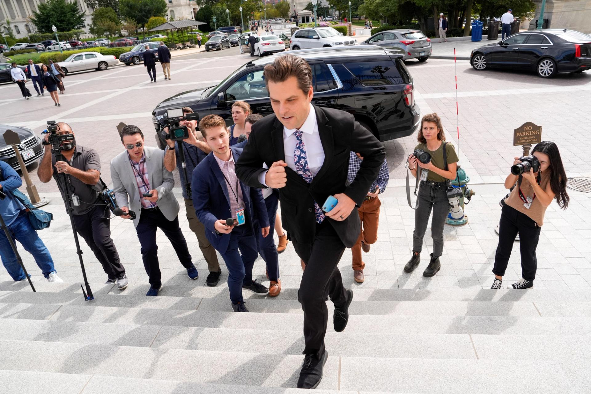 U.S. Representative Matt Gaetz (R-FL) runs up the East Capitol stairs as the deadline to avert a partial government shutdown approaches on Capitol Hill in Washington, U.S., September 30, 2023.