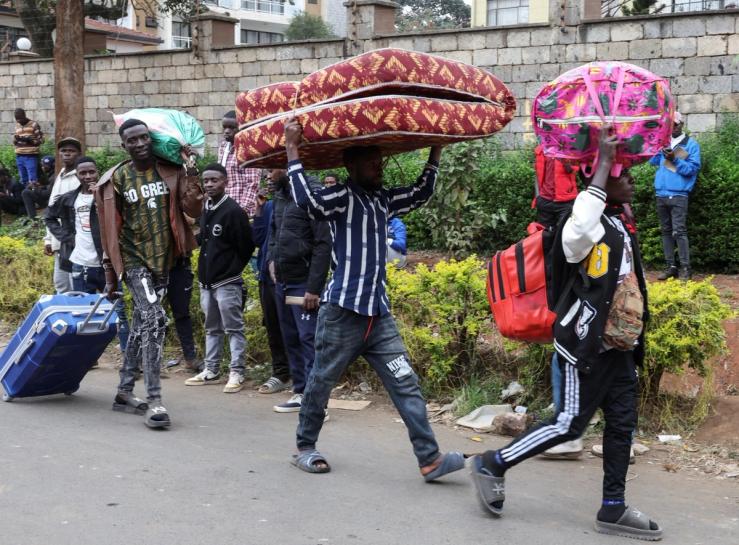 Burundian nationals arrive at their country’s embassy with their luggage as they seek travel documents to return to Burundi despite Kenya’s government offering a temporary amnesty to undocumented East African nationals fearing a crackdown on small-scale traders from abroad, in Nairobi, Kenya, September 8, 2026.
