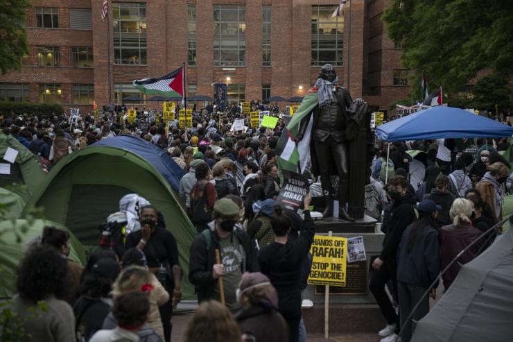 Students at George Washington University gather to protest against the war in Gaza and show support for Palestinians on April 25, 2024.