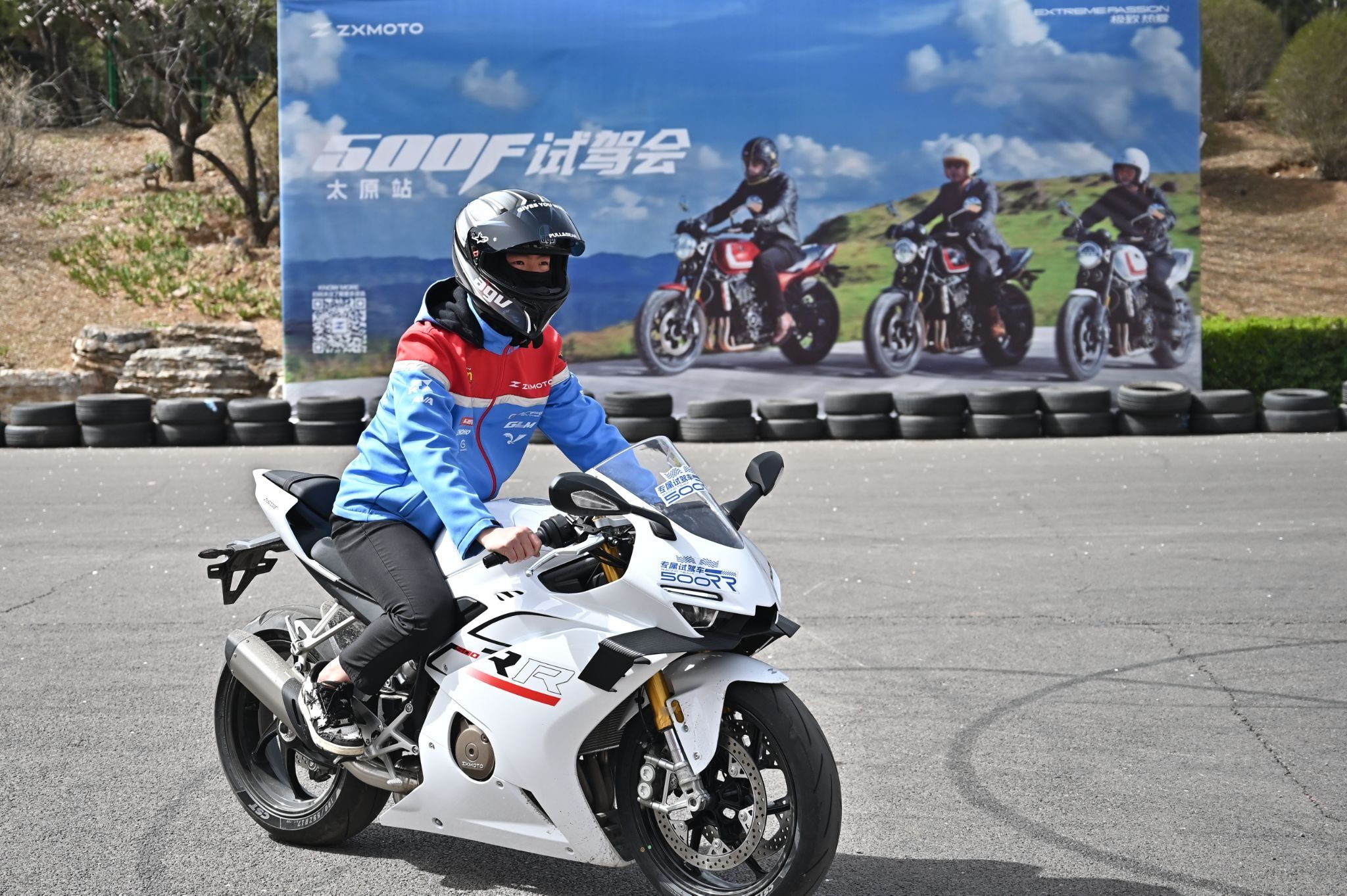 A staff member shows a ZXMOTOR 500RR motorcycle on April 3, 2026 in Taiyuan, Shanxi Province of China. 