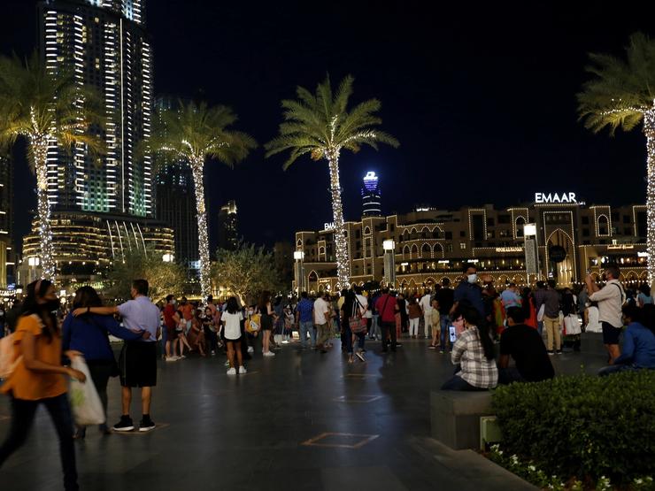 People are seen outside the Dubai mall during the holy month of Ramadan in Dubai, UAE, April, 2021.