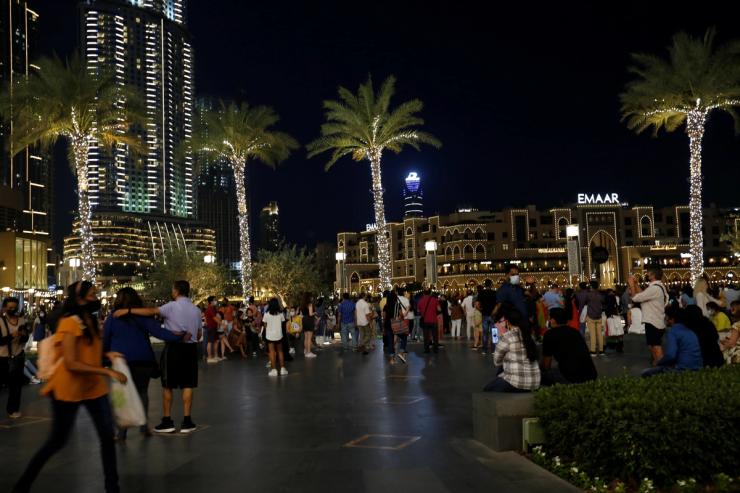 People are seen outside the Dubai mall during the holy month of Ramadan in Dubai, UAE, April, 2021.
