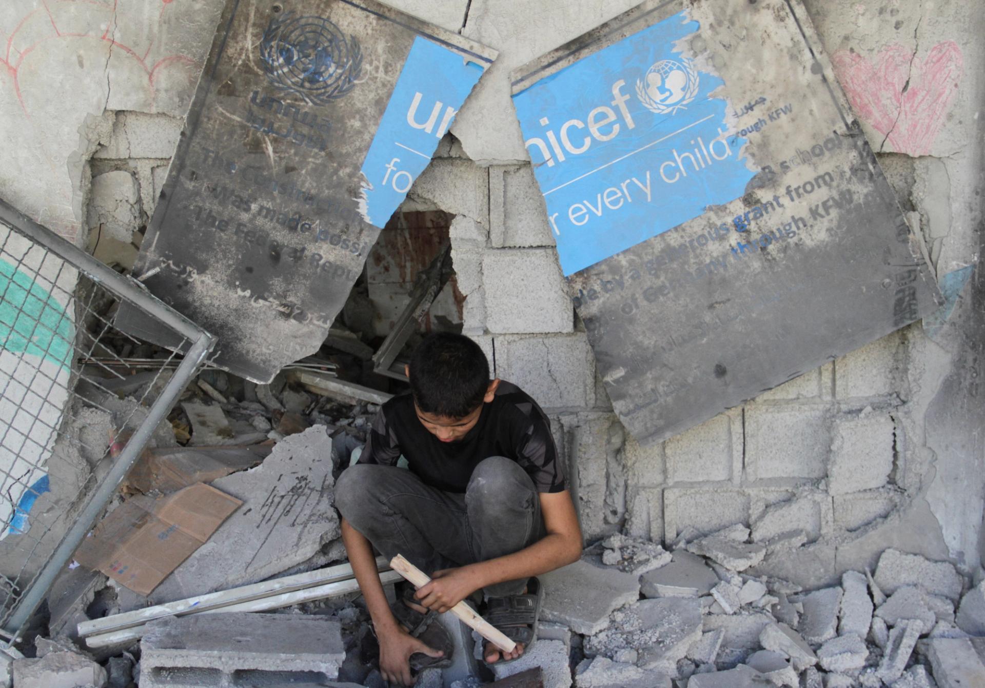 The site of an Israeli strike on a school sheltering displaced people in Gaza.