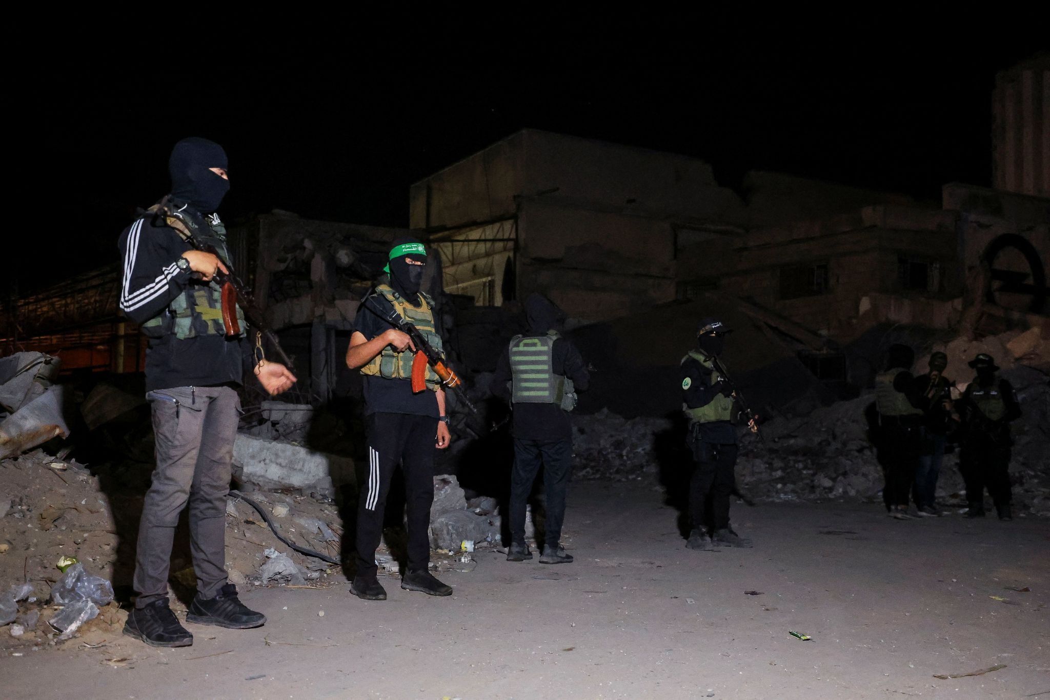 Hamas militants stand guard in Gaza. 