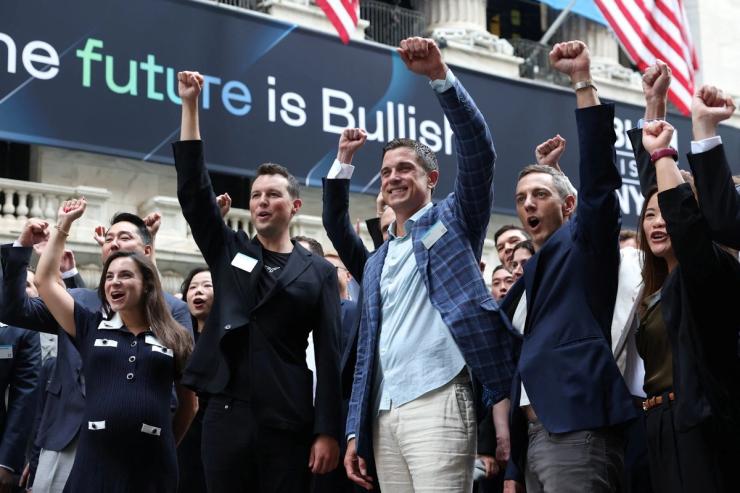 Bullish c-suite celebrates on Wall Street.