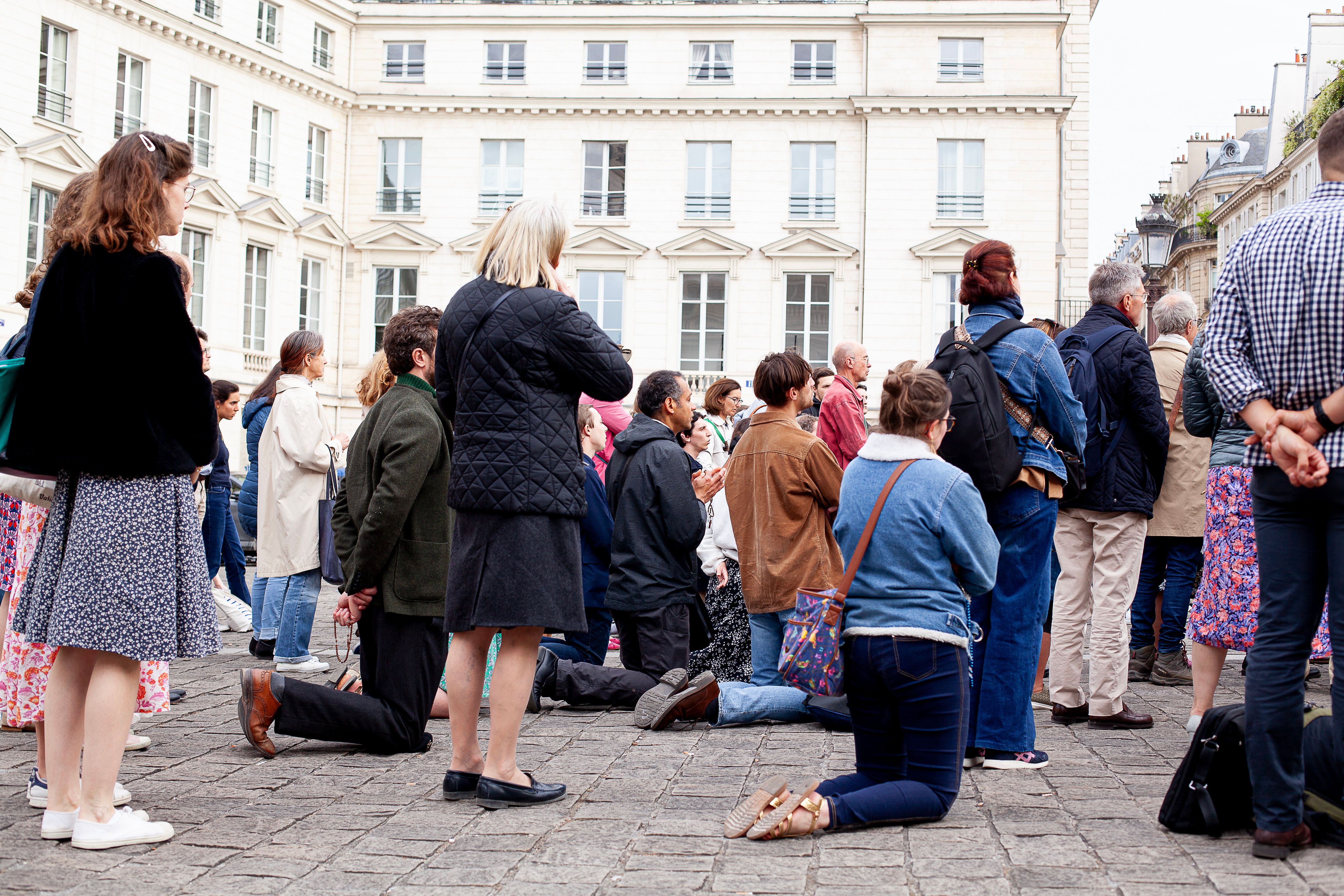 Protesters hold a prayer vigil in opposition to France’s assisted dying law.