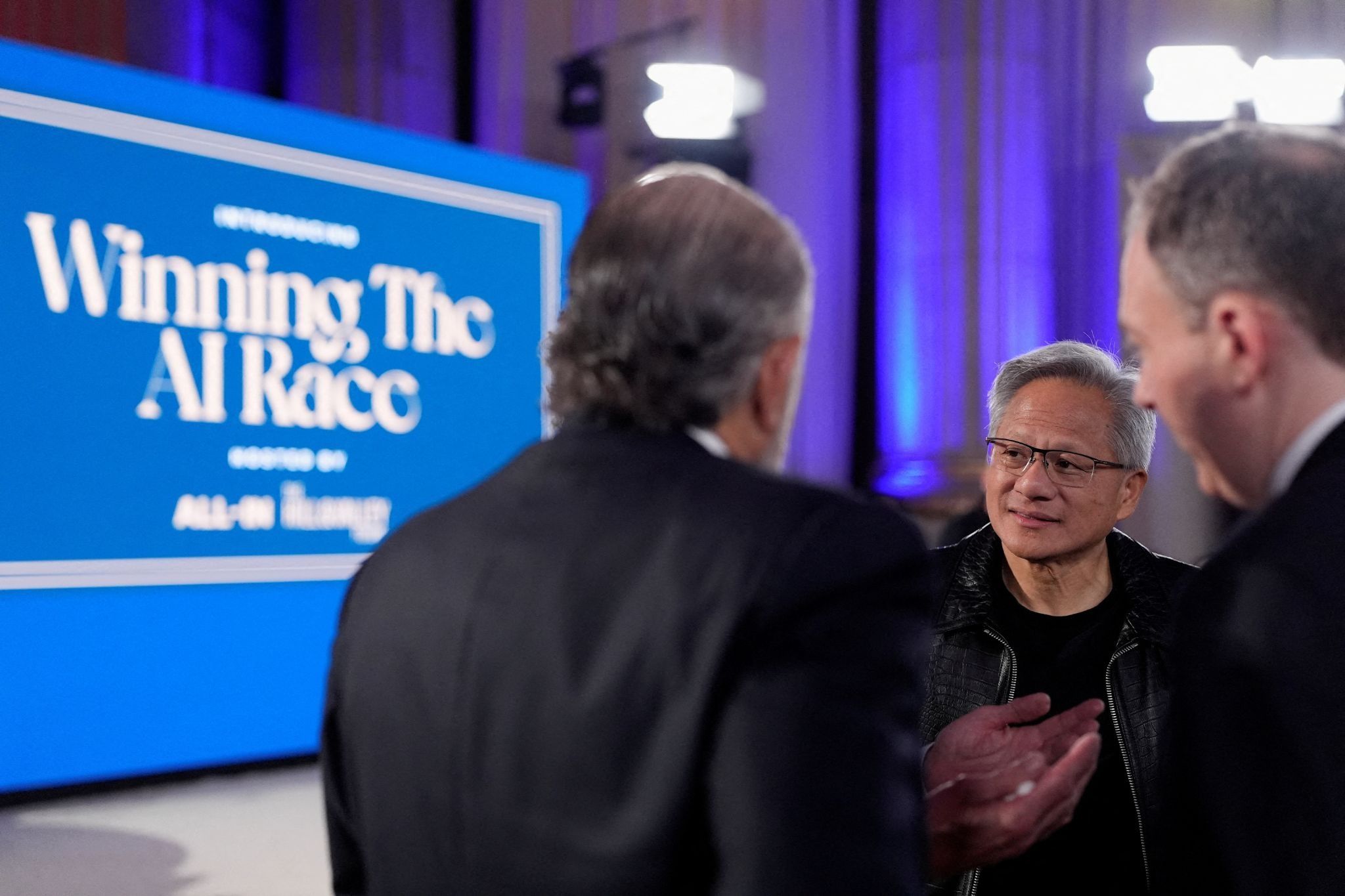 Nvidia CEO Jensen Huang with US officials. 