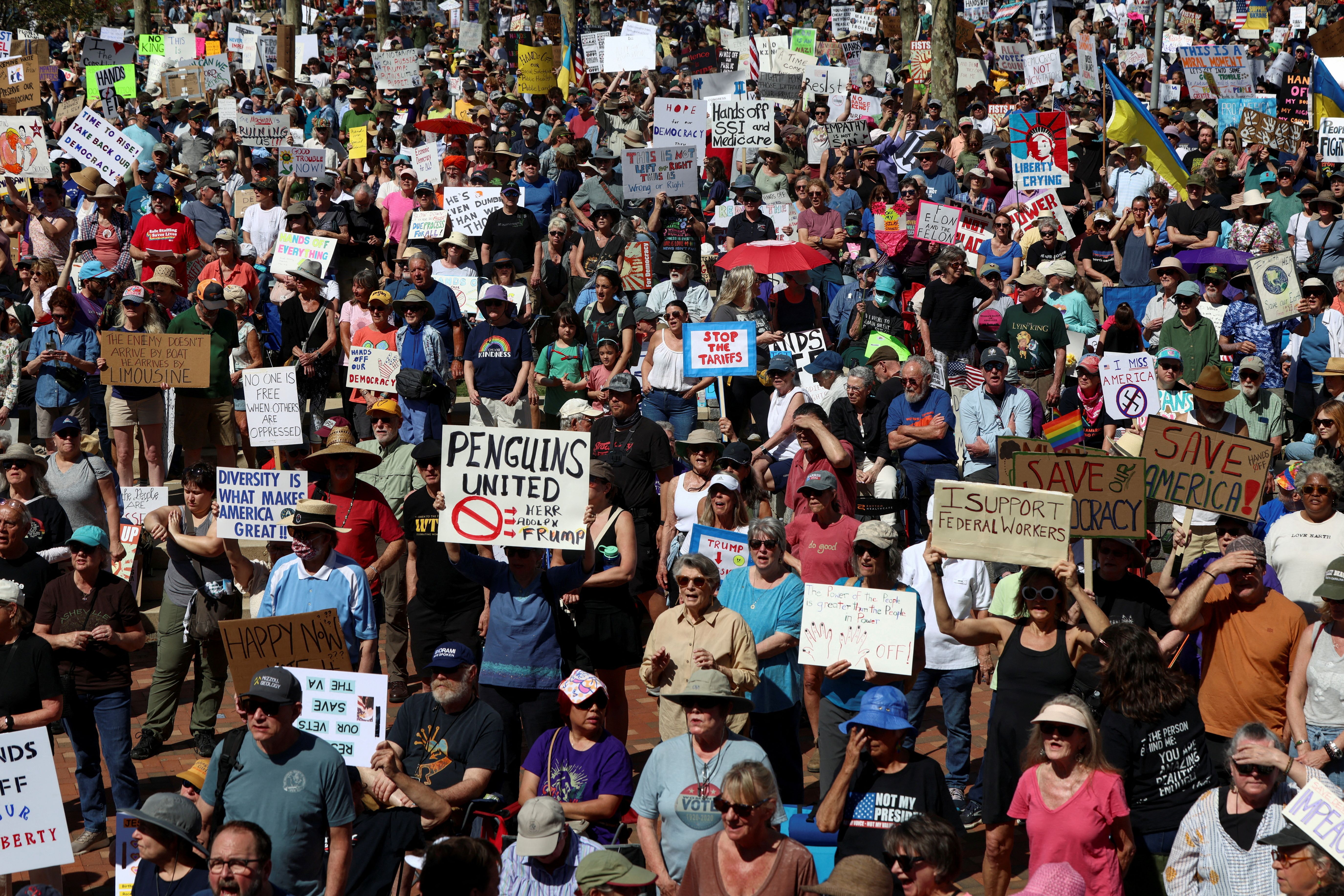 Demonstrators in Asheville, North Carolina, rally against US President Donald Trump on April 5
