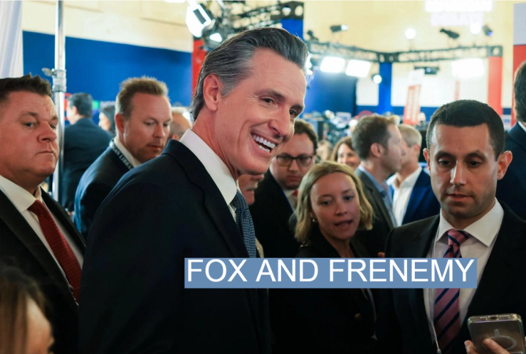 California Gov. Gavin Newsom talks with reporters following Wednesday’s GOP presidential primary debate in Simi Valley.