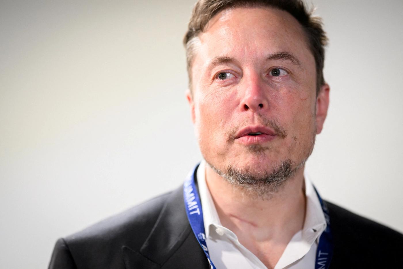 Tesla, X (formerly known as Twitter) and SpaceX's CEO Elon Musk speaks with members of the media during the AI Safety Summit at Bletchley Park in Bletchley, Britain on November 1, 2023. Leon Neal/Pool via REUTERS/File Photo