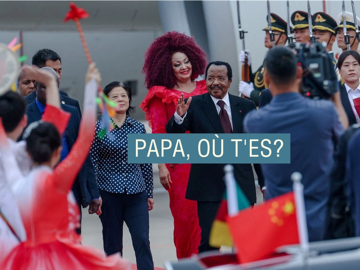 Cameroon President Paul Biya waves to a crowd