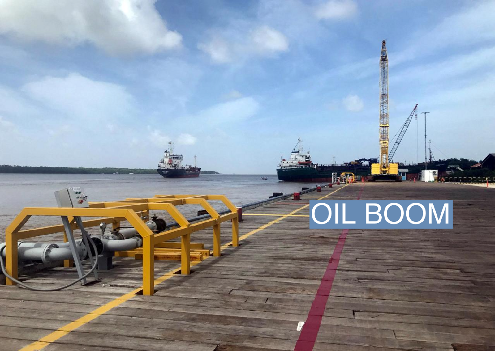 Vessels carrying supplies for an offshore oil platform operated by Exxon Mobil are seen at the Guyana Shore Base Inc wharf on the Demerara River, south of Georgetown, Guyana January 23, 2020. REUTERS/Luc Cohen/File Photo