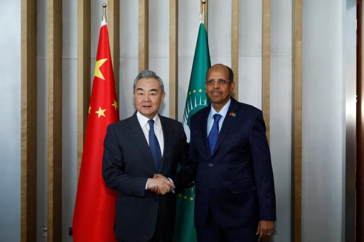 Chinese Foreign Minister Wang Yi and African Union chief Mahmoud Ali Youssouf.