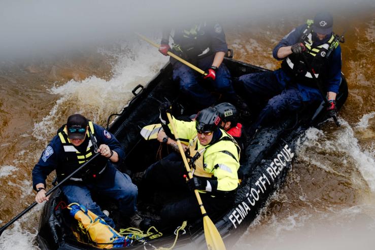 FEMA task force navigates the Guadalupe River on a boat as search for victims in Texas.