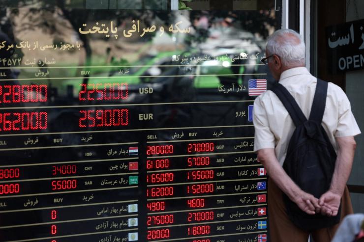 A sign showing currency exchange rates in Tehran