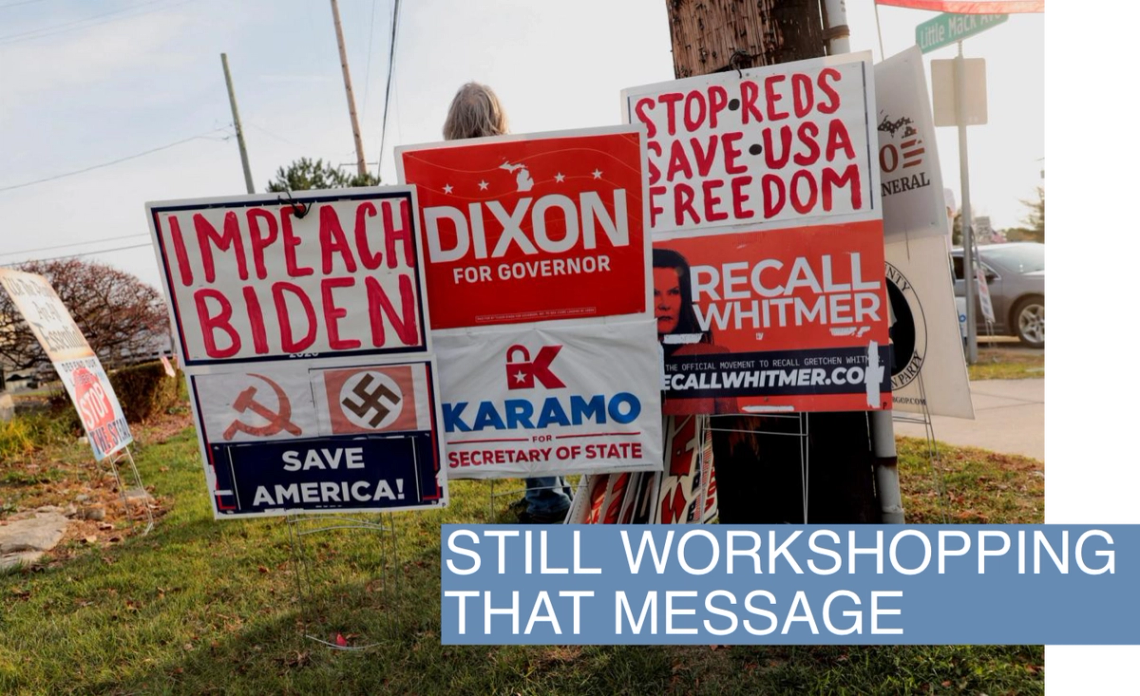 A view of campaign signs posted on a street corner by attendees of a campaign rally for Republican candidate for Michigan Governor, Tudor Dixon, in Clinton Township, Michigan, U.S. November 4, 2022.