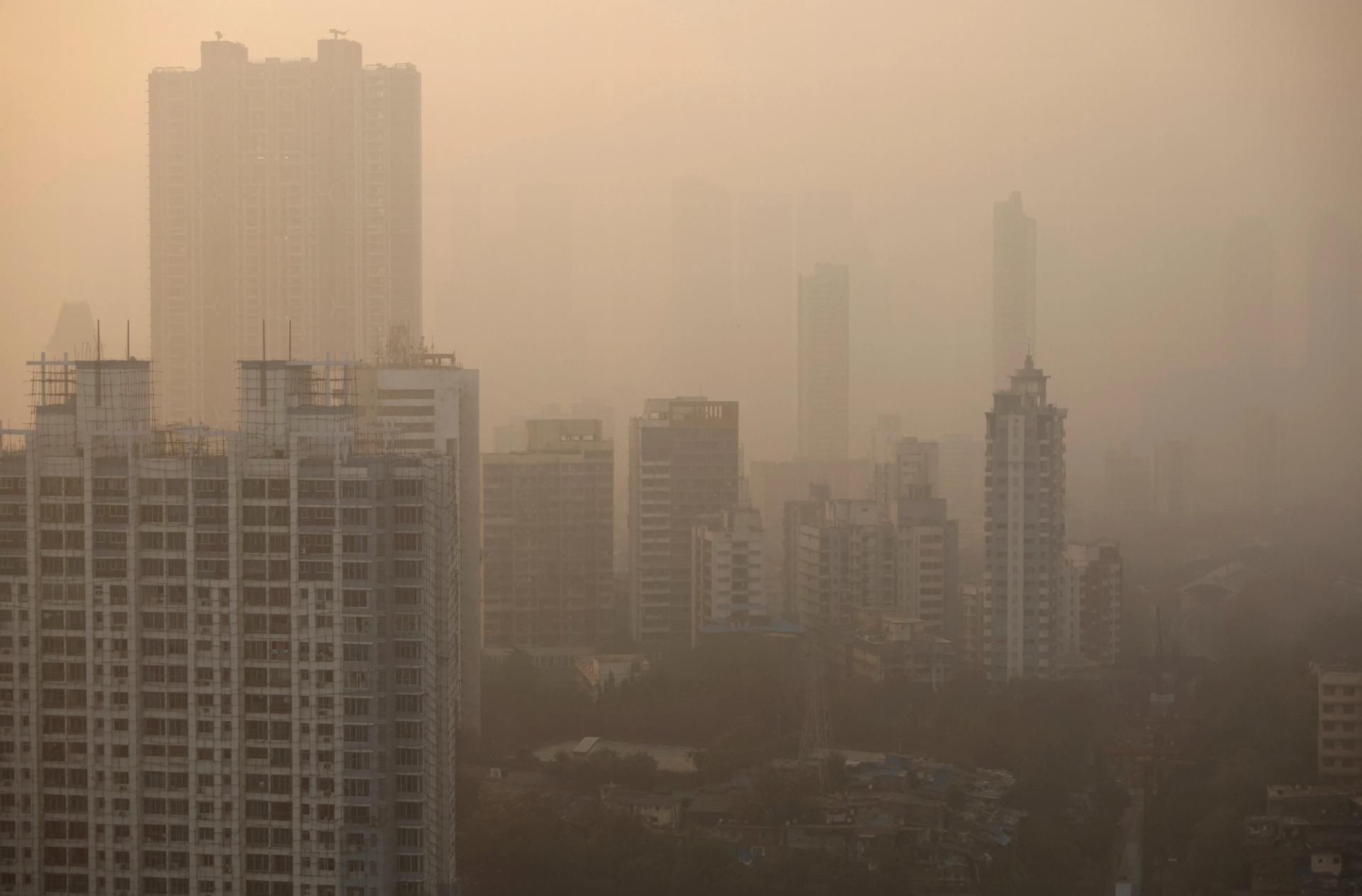 Buildings are seen on a smoggy evening in Mumbai, India