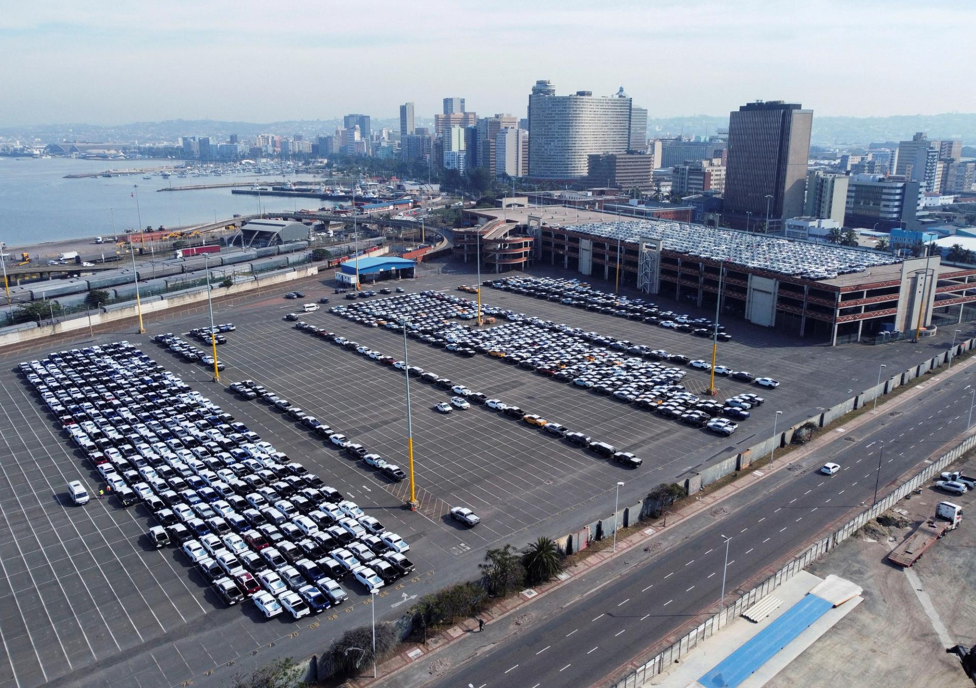 A drone view of cars, ready to be loaded onto a ship, at the car terminal in port in Durban, South Africa.