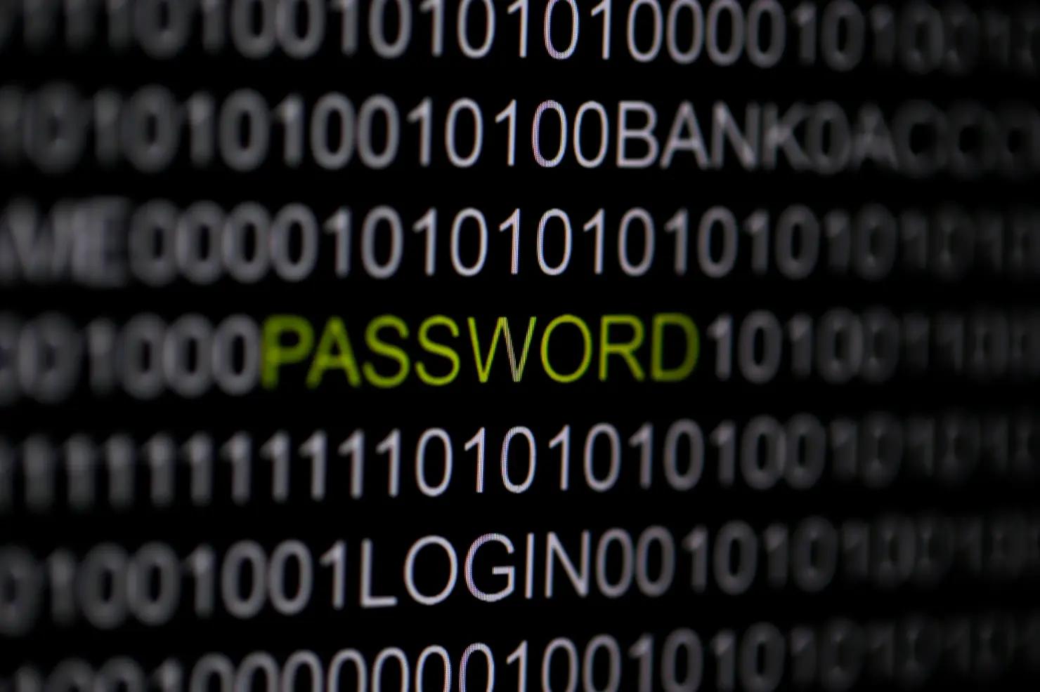 An illustration of binary code surrounding the word “password”