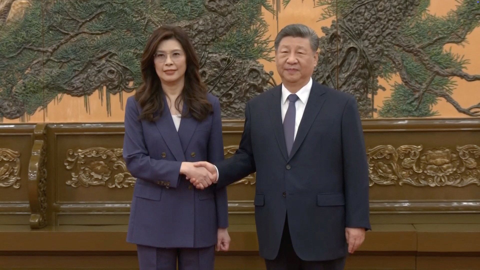KMT leader Cheng Li-wun and Xi Jinping. 