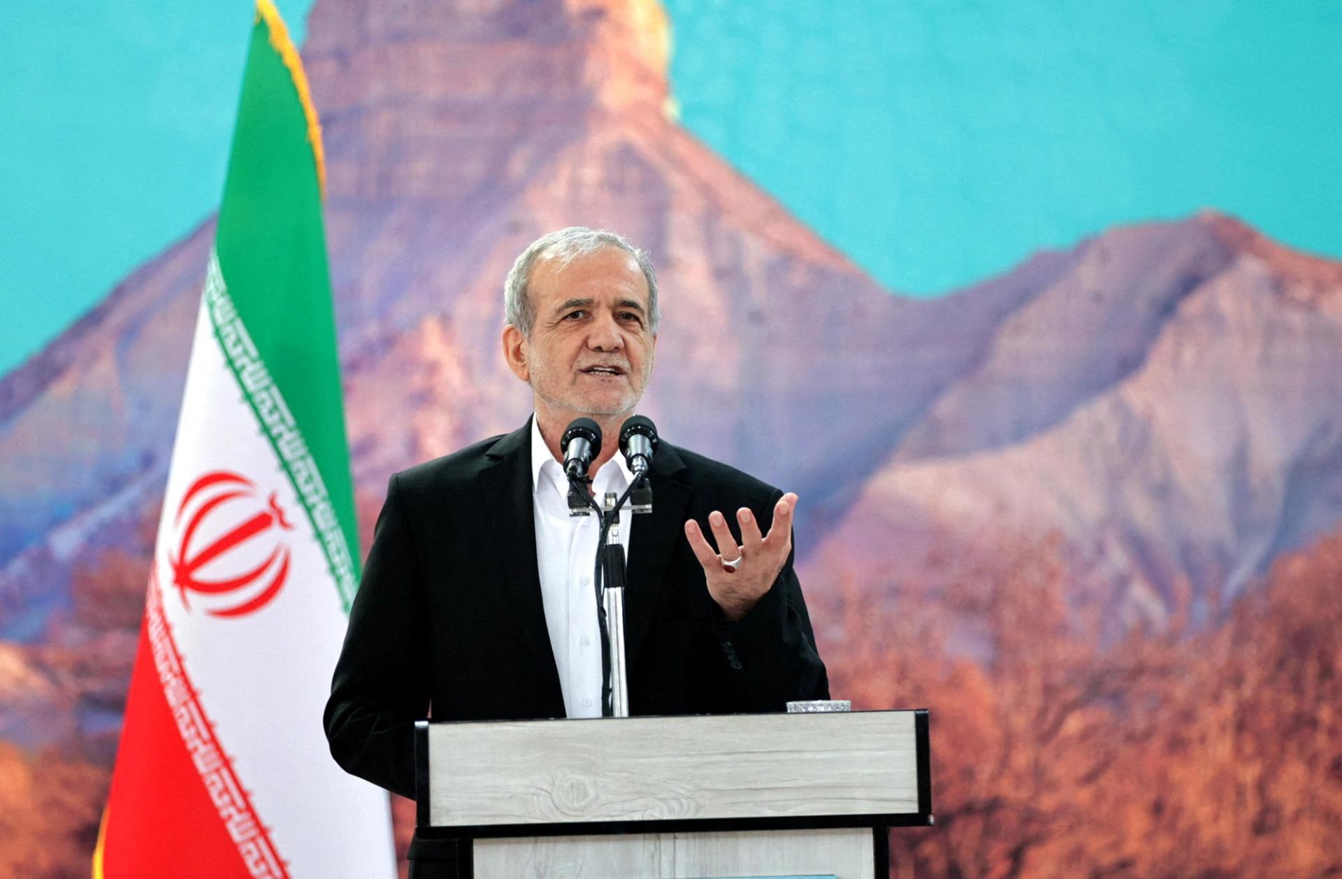 Iranian President Masoud Pezeshkian speaks during a meeting in Ilam, Iran