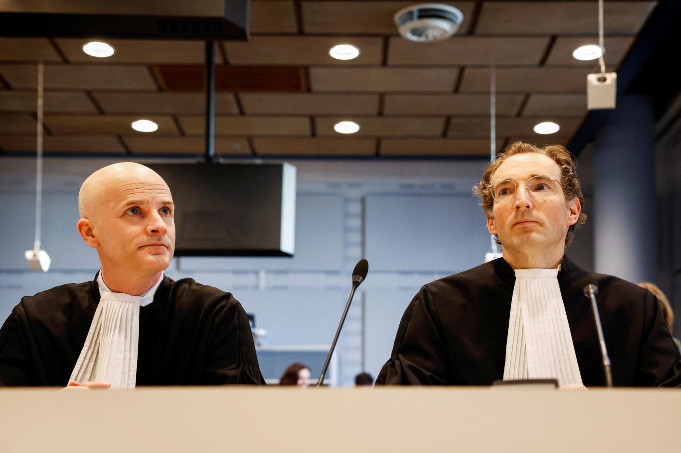 Lawyers of the state Erik Koppe and Reimer Veldhuis look on amid the court case of human rights groups who seek to block the Dutch government from exporting F-35 fighter jet parts to Israel, which they claim enables war crimes in the besieged Gaza Strip, in The Hague, Netherlands