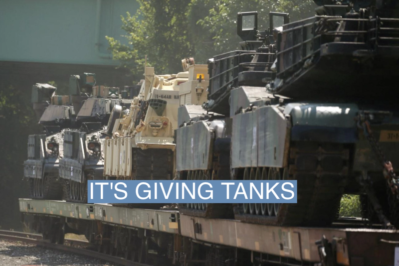 M1 Abrams tanks and other armored vehicles sit atop flat cars in a rail yard in Washington, U.S., July 2, 2019.