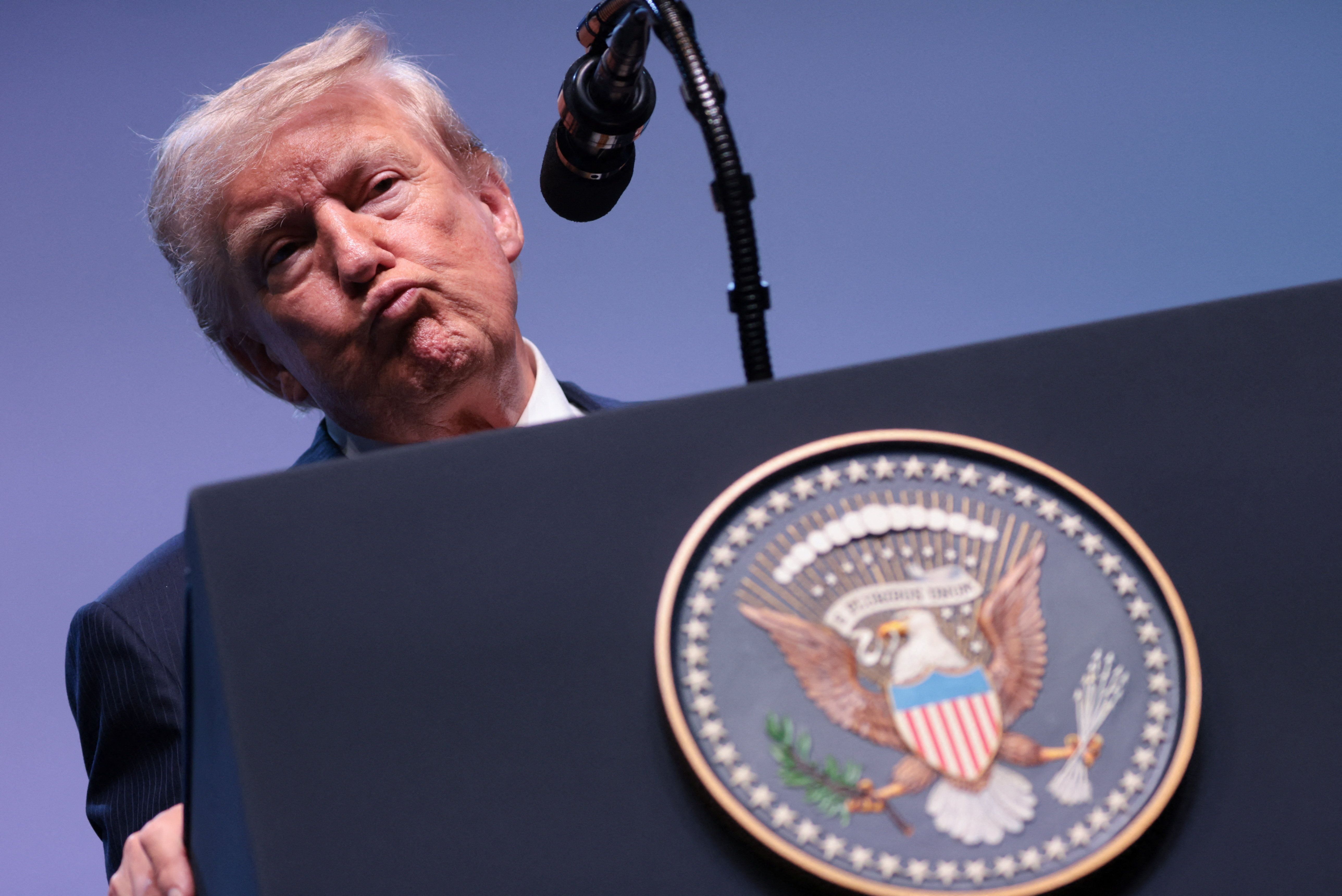 U.S. President Donald Trump reacts as he holds a press conference at the end of his participation in the NATO leaders summit at the Bestepe Presidential Compound in Ankara, Turkey.