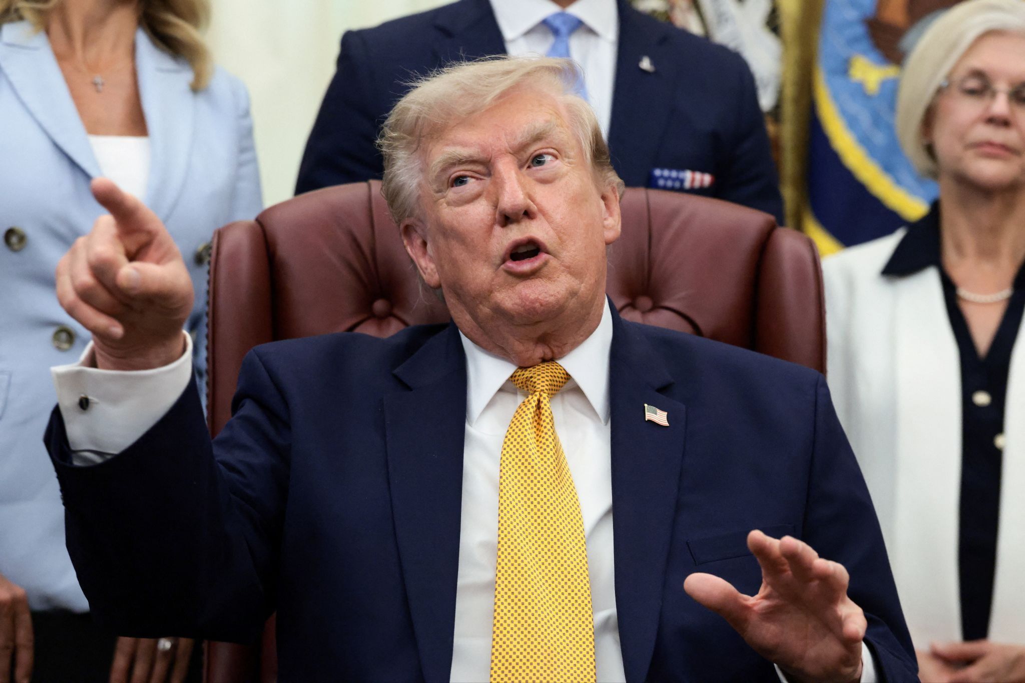 US President Donald Trump points his finger as he answers questions from the media, in the Oval Office at the White House on Aug. 3, 2026.