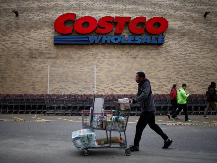 A shopper pushes a shopping cart at a Costco store ahead of Black Friday in Arlington, Virginia.