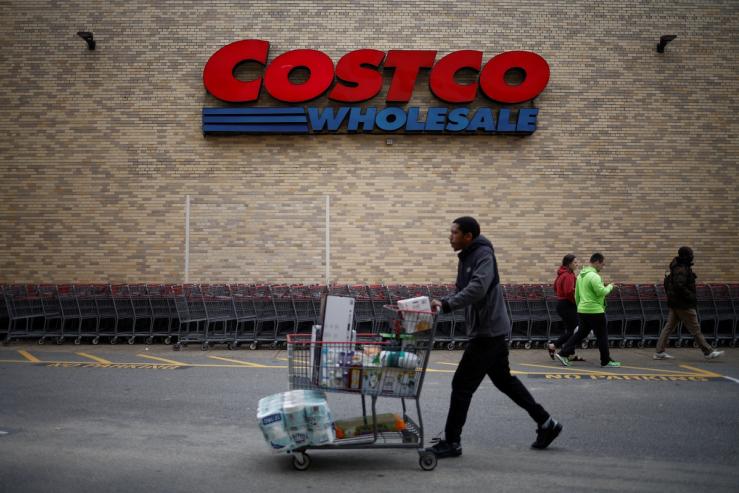 A shopper pushes a shopping cart at a Costco store ahead of Black Friday in Arlington, Virginia.