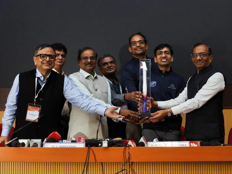 V. Narayanan, Chairman of the Indian Space Research Organisation, Pawan Goenka, Chairman of IN-SPACe, Pawan Kumar Chandana, Co-founder and CEO of Skyroot Aerospace, and Naga Bharath Daka, Co-founder and COO of Skyroot Aerospace, pose with a model of the Vikram-1 rocket after a press briefing following the successful launch of Skyroot Aerospace’s Vikram-1 rocket into orbit, making it the first Indian private company to place a satellite in orbit, at the Satish Dhawan Space Centre in Sriharikota