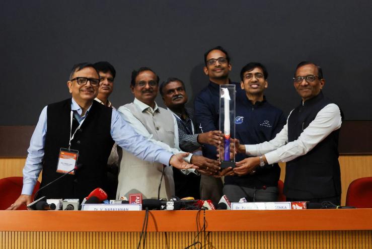 V. Narayanan, Chairman of the Indian Space Research Organisation, Pawan Goenka, Chairman of IN-SPACe, Pawan Kumar Chandana, Co-founder and CEO of Skyroot Aerospace, and Naga Bharath Daka, Co-founder and COO of Skyroot Aerospace, pose with a model of the Vikram-1 rocket after a press briefing following the successful launch of Skyroot Aerospace’s Vikram-1 rocket into orbit, making it the first Indian private company to place a satellite in orbit, at the Satish Dhawan Space Centre in Sriharikota
