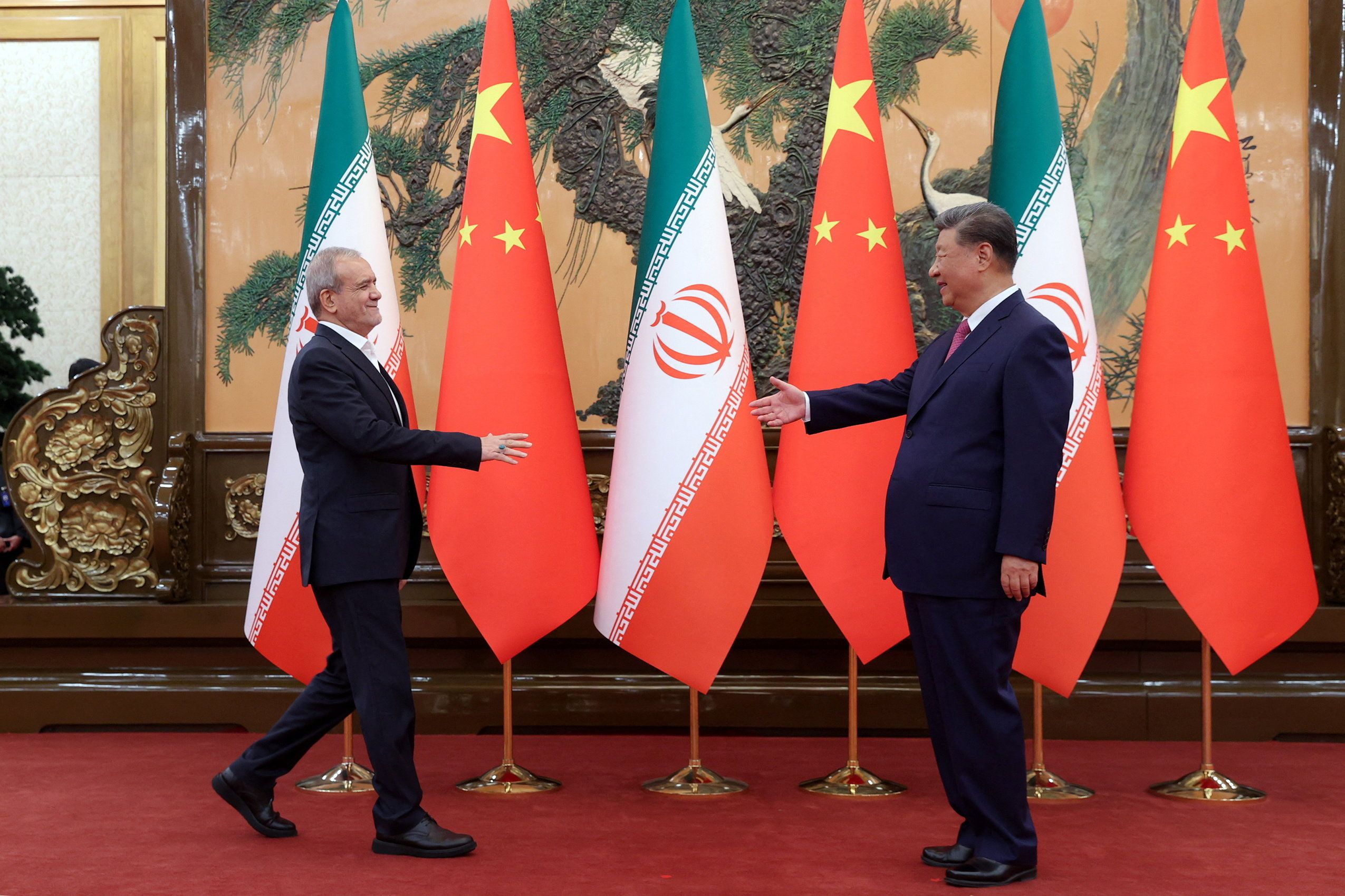 Iran’s and China’s leaders meet in Beijing