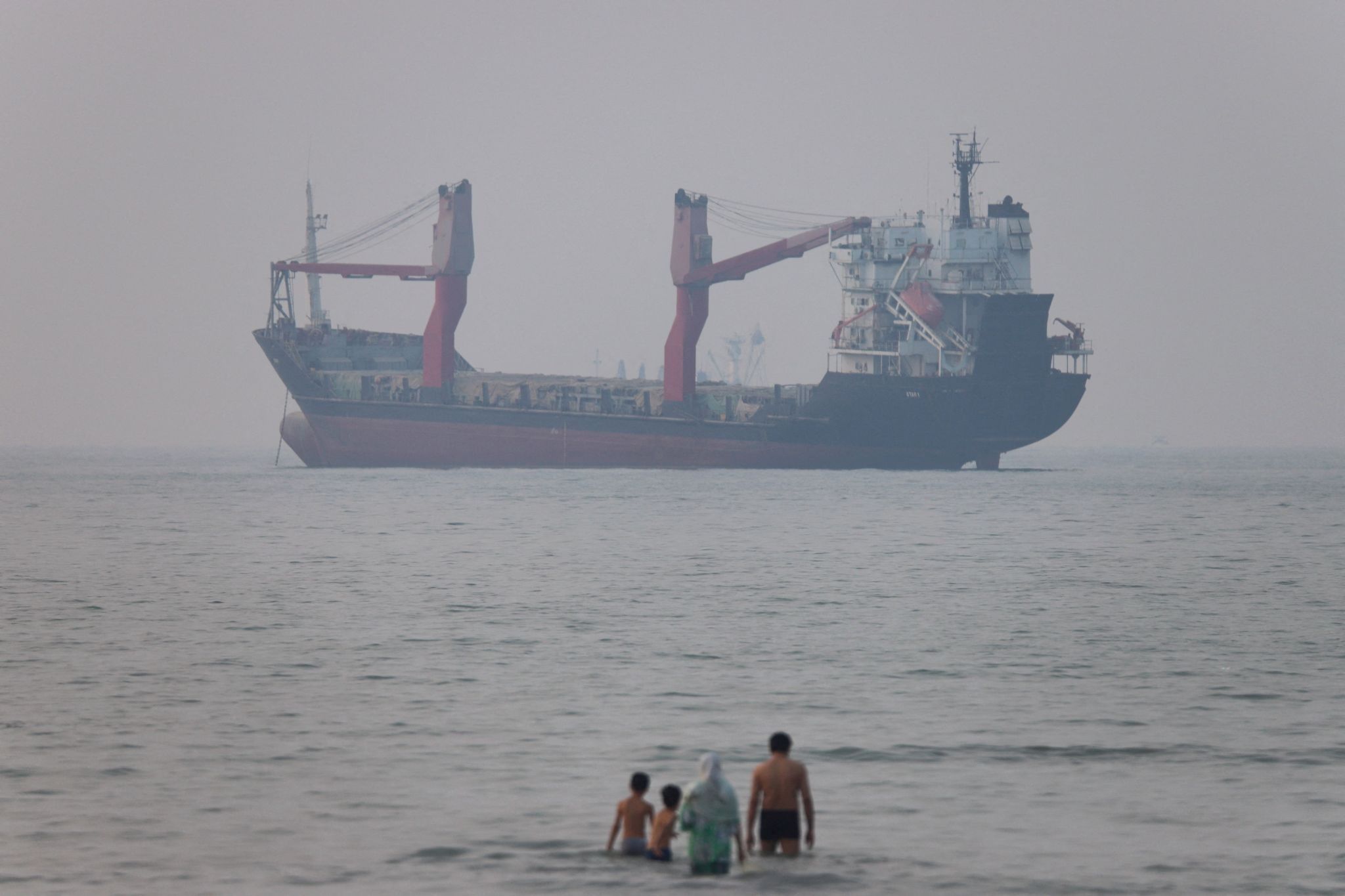 A vessel in the Strait of Hormuz near the beach of Bandar Abbas, Iran. Amirhosein Khorgooi/ISNA/via WANA via Reuters.