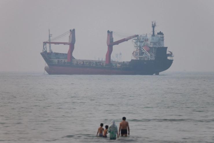 A vessel in the Strait of Hormuz near the beach of Bandar Abbas, Iran. Amirhosein Khorgooi/ISNA/via WANA via Reuters.
