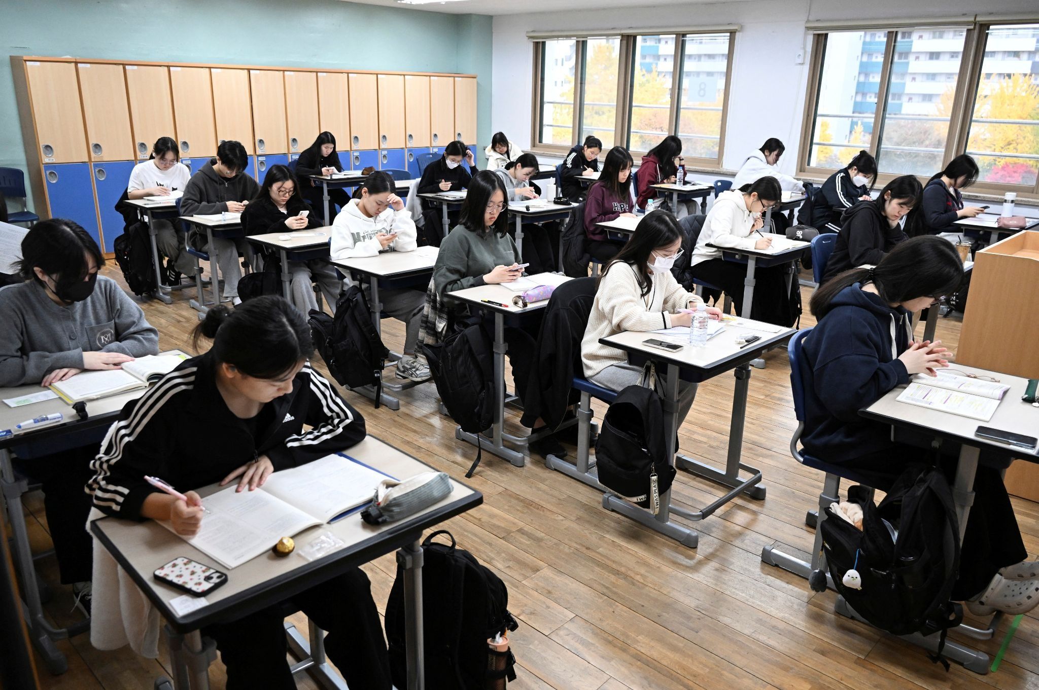 South Korean students seated at classroom desks