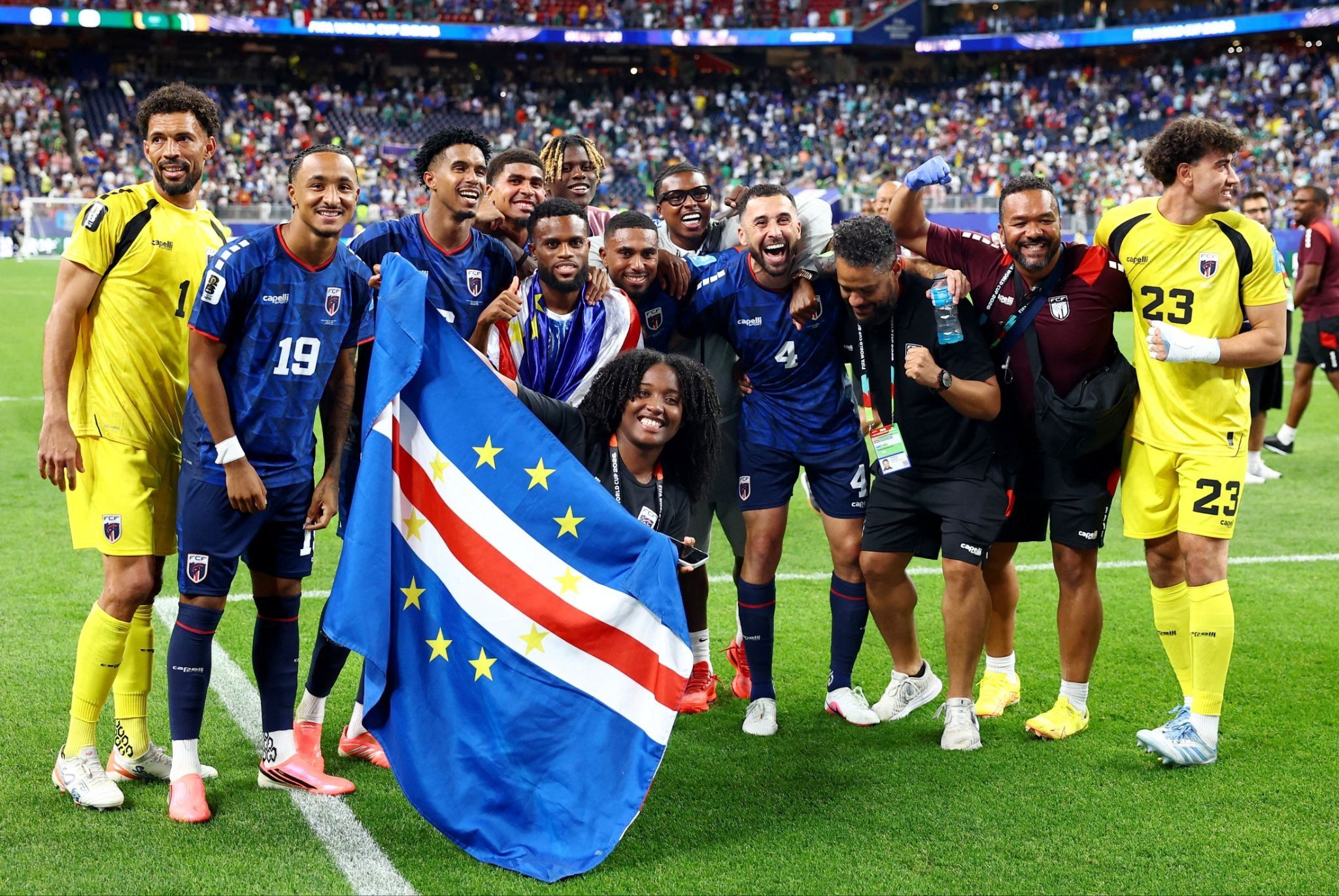 Soccer Football - FIFA World Cup 2026 - Group H - Cape Verde v Saudi Arabia - Houston Stadium, Houston, Texas, U.S. - June 26, 2026 Cape Verde players and staff celebrate after the match as Cape Verde qualify for the knockout stages of the World Cup. 