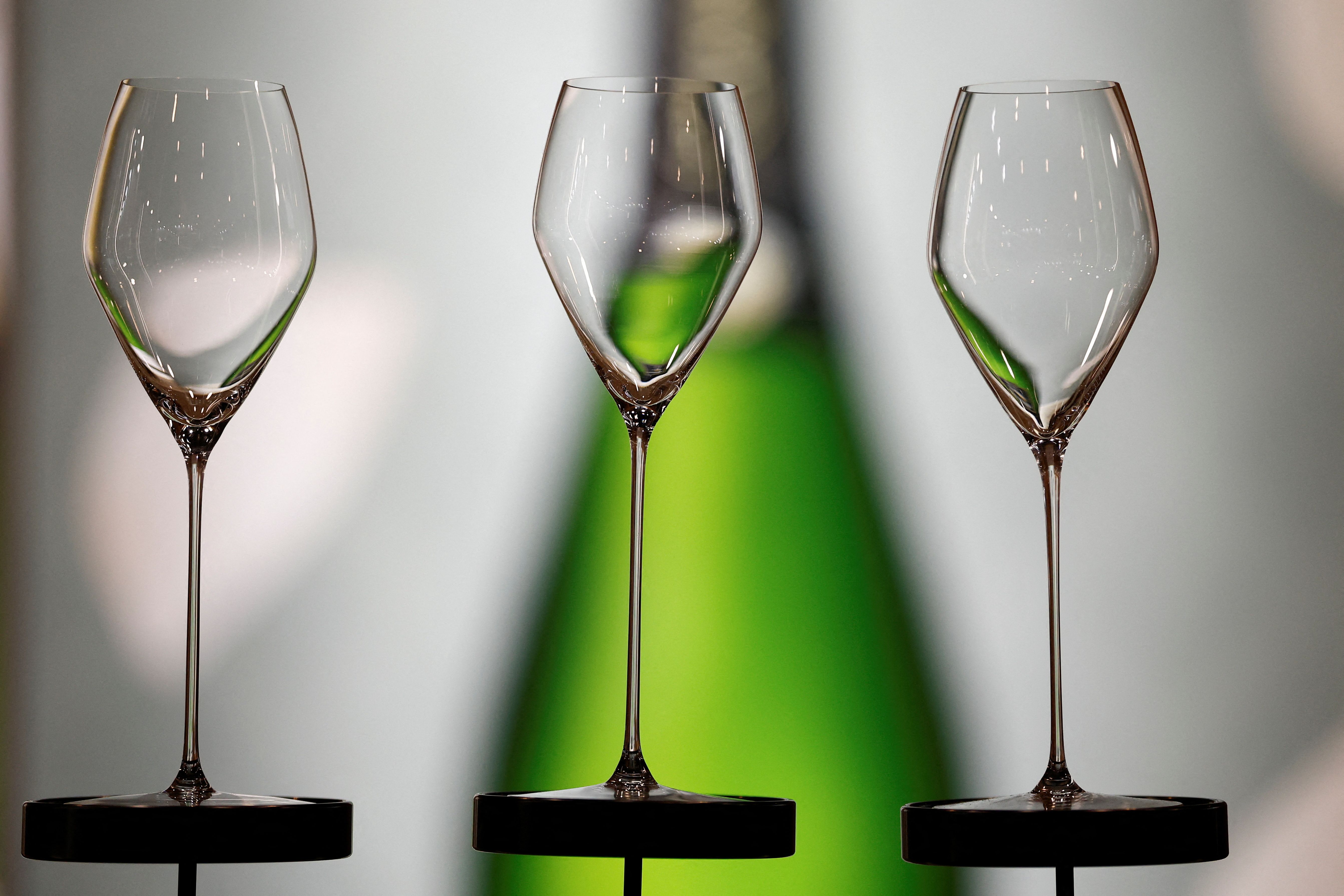 Empty champagne glasses sit on display during the Wine Paris trade fair in Paris, France, February 12, 2025.