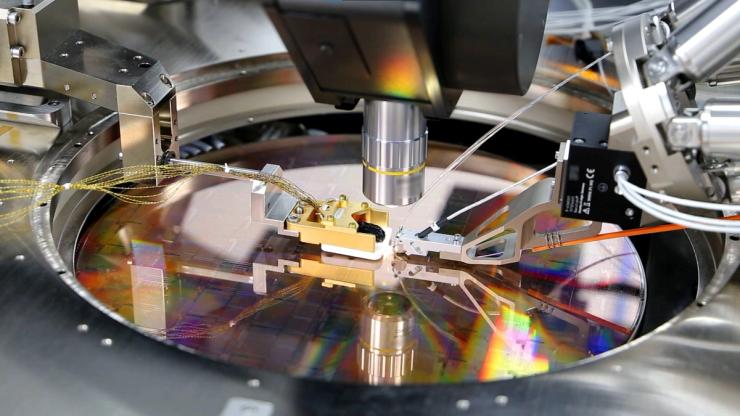A view of a PsiQuantum Wafer, a silicon wafer containing thousands of quantum devices