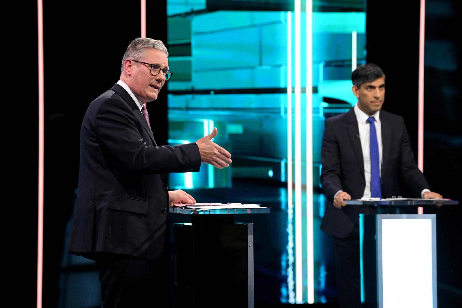 Rishi Sunak and Keir Starmer lock heads at the first head-to-head debate of the UK general election campaign