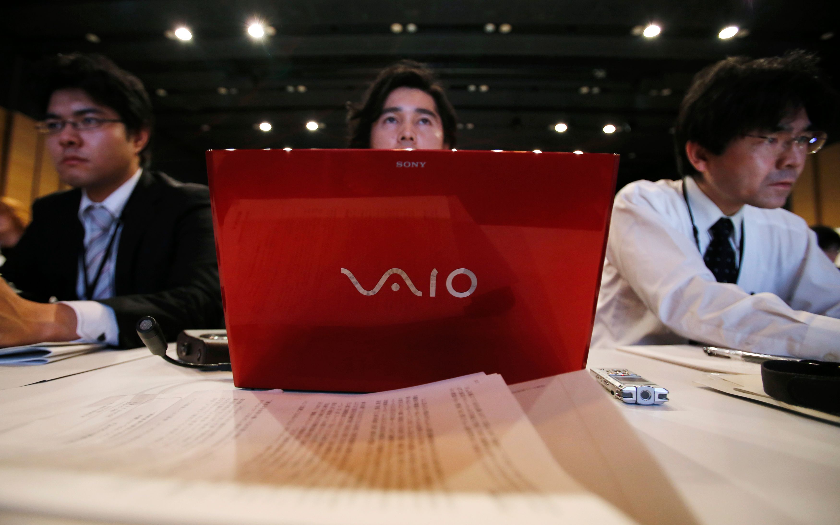 People using laptops.
