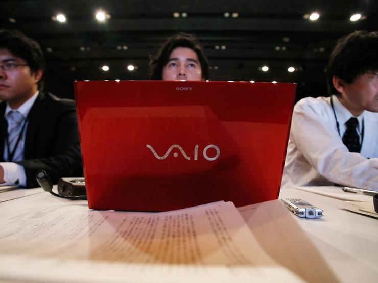 People using laptops.