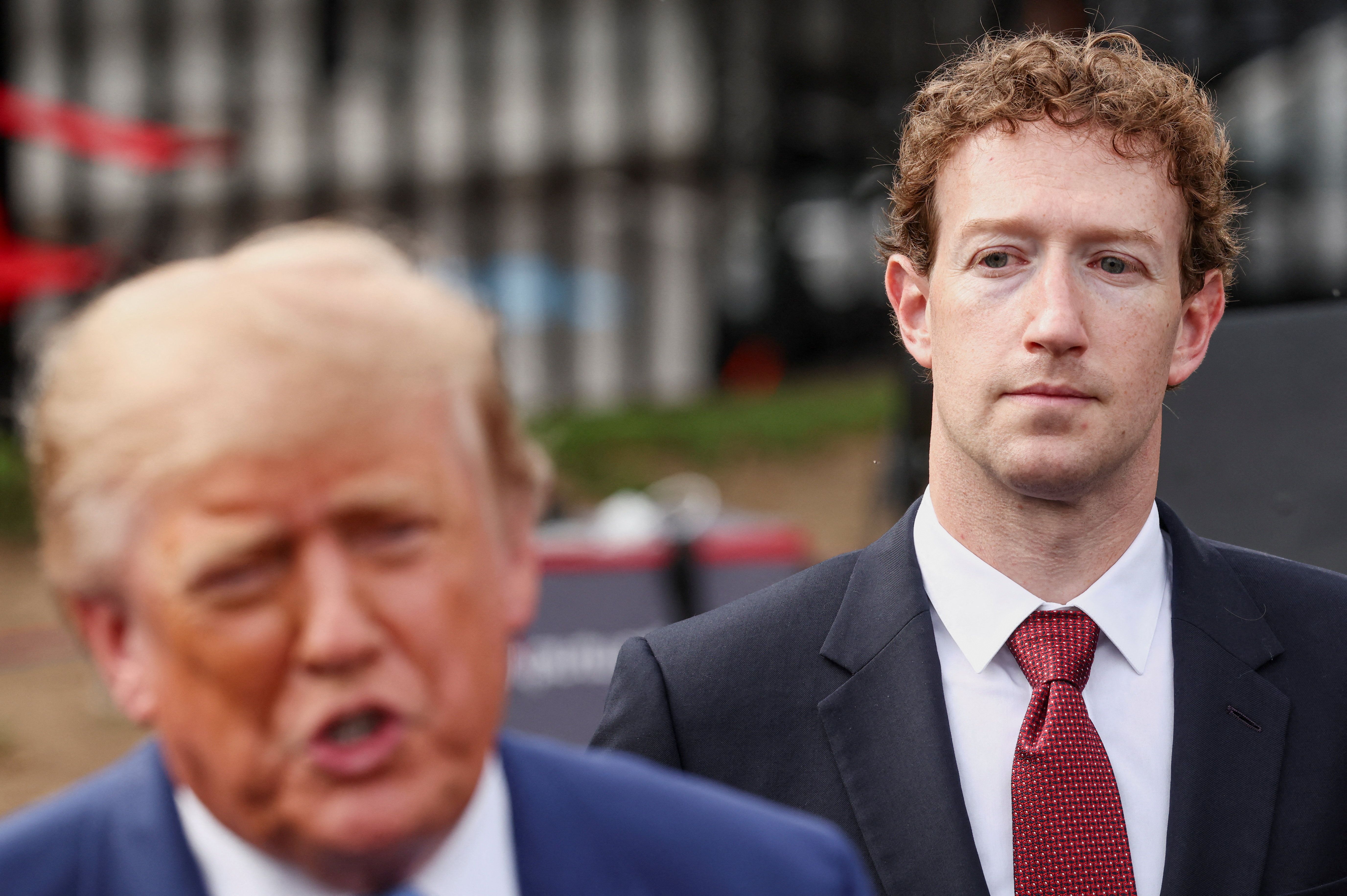 Meta CEO Mark Zuckerberg listens to US President Donald Trump speak during a press conference at the White House driveway following a luncheon for tech leaders in the East Room, in Washington.