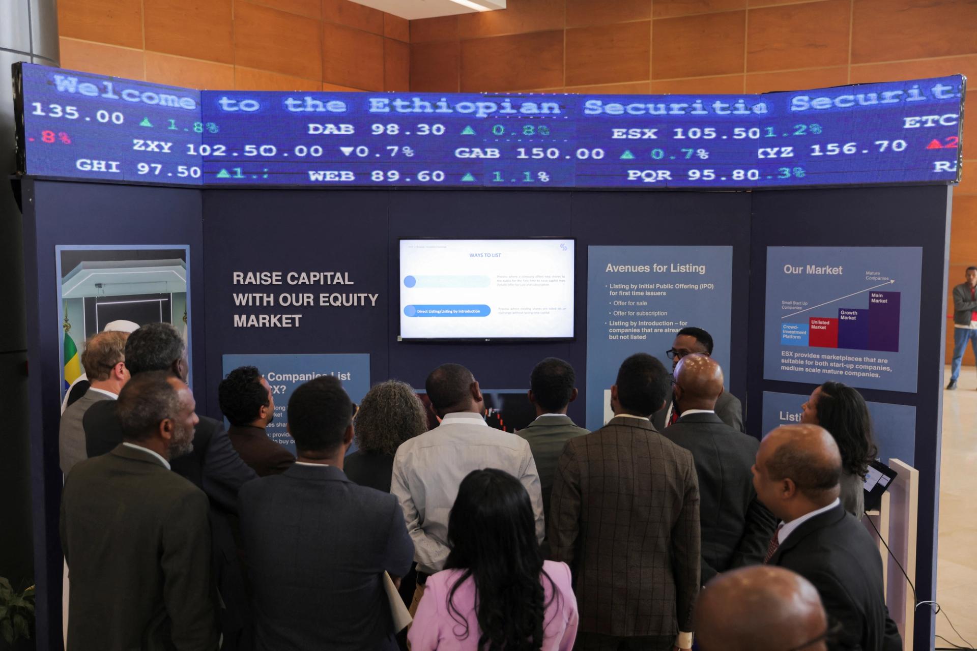 Delegates review a screen during the launching ceremony of the Ethiopian Security Exchange stock market in Addis Ababa, Ethiopia, January 10, 2025.