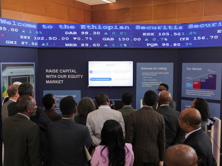 Delegates review a screen during the launching ceremony of the Ethiopian Security Exchange stock market in Addis Ababa, Ethiopia, January 10, 2025.