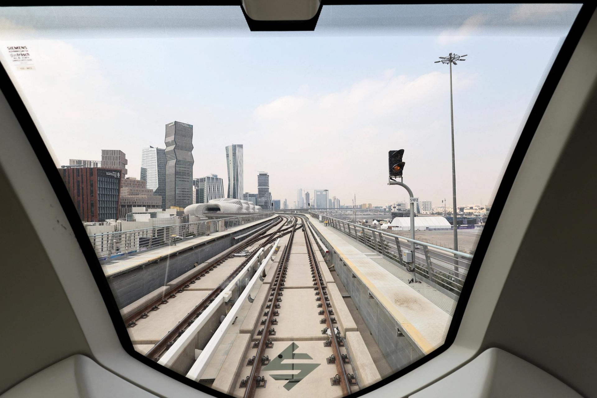 A view from inside of the green line of Riyadh Metro, as it approaches the King Abdullah Financial District Metro Station in Riyadh.