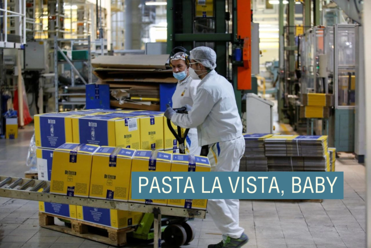 Warehouse workers transport a pallet of De Cecco pasta
