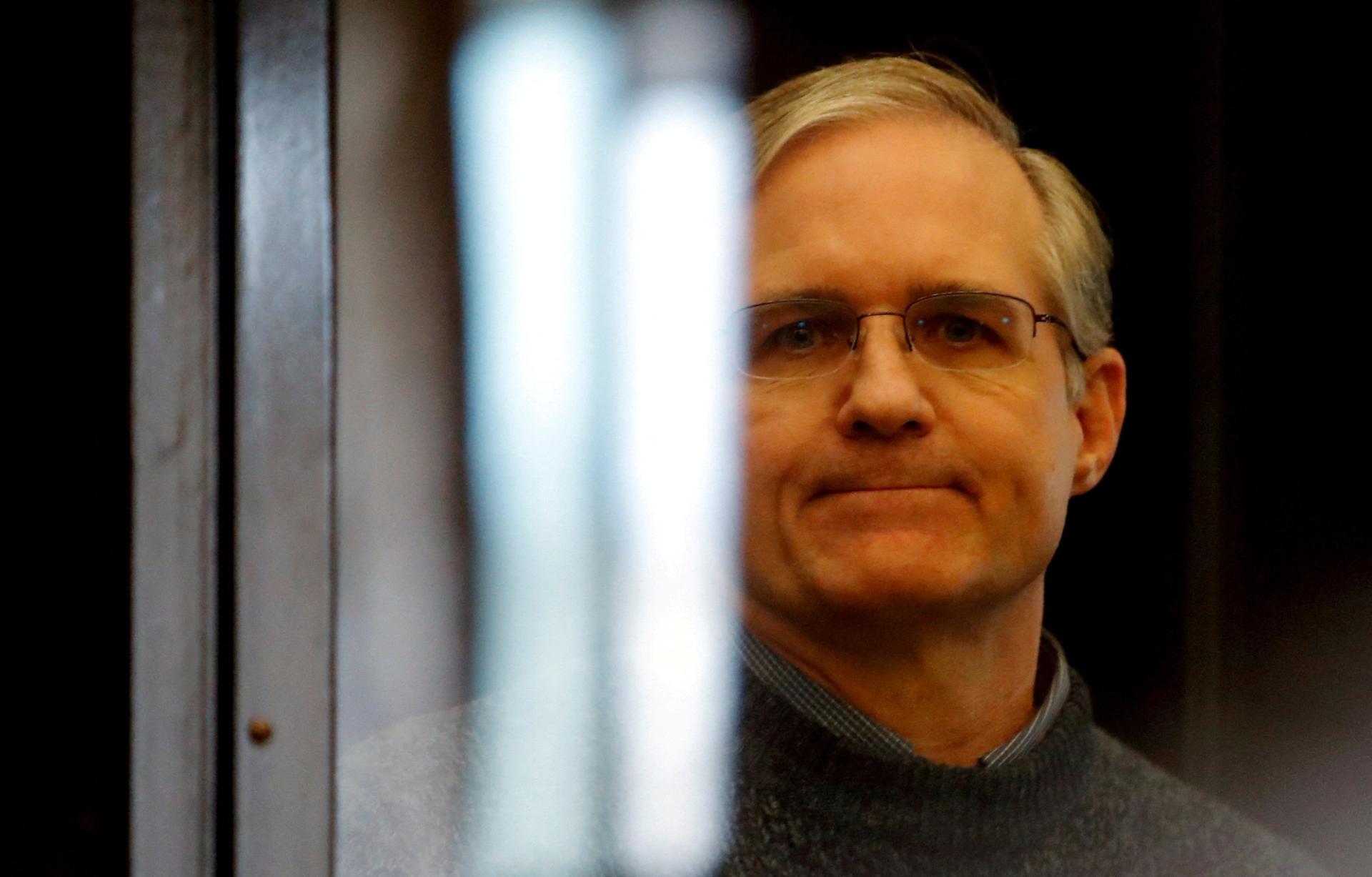 Former U.S. Marine Paul Whelan stands inside a defendants' cage during his verdict hearing in Moscow, Russia June 15, 2020.